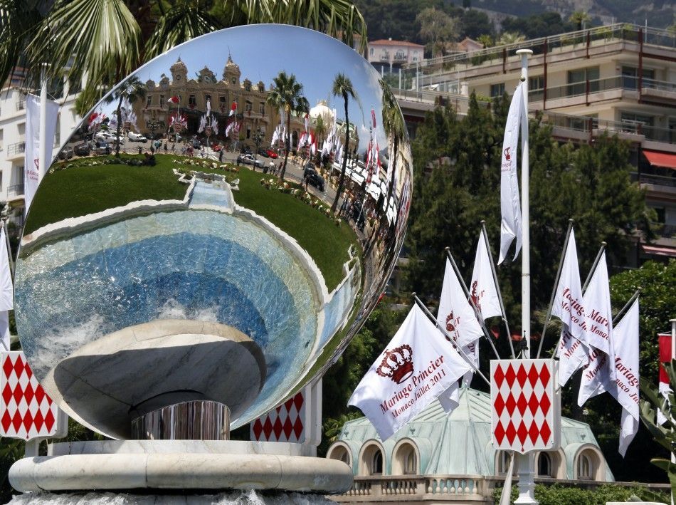 Flags announcing the wedding of Prince Albert II of Monaco and his fiancee Charlene Wittstock are seen in front of Monaco casino