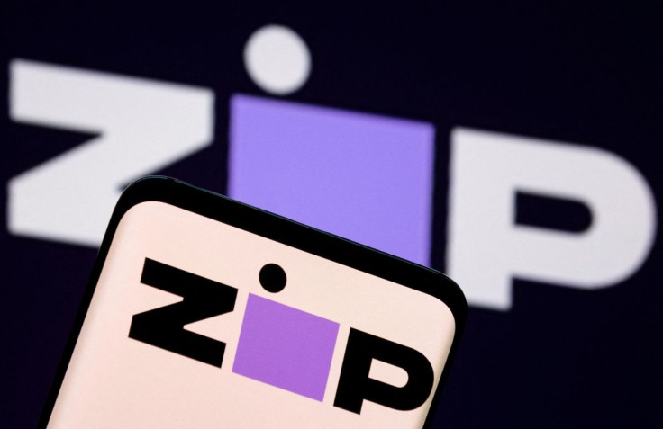 Zip logo is seen on a smartphone in front of displayed same logo in this illustration taken January 25, 2022. 