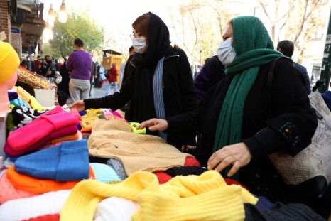 Women shop at a street in Tehran, Iran, November 29, 2021. Majid Asgaripour/WANA (West Asia News Agency) via REUTERS 