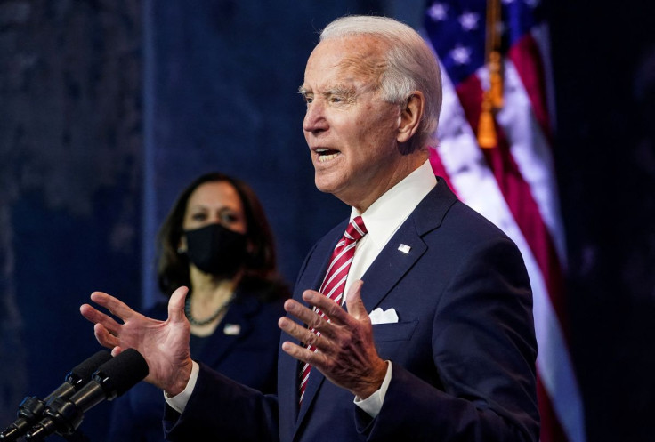 U.S. President-elect Joe Biden speaks about the U.S. economy as Vice President-elect Kamala Harris stands by following their briefing with economic advisers in Wilmington, Delaware, U.S., November 16, 2020. 