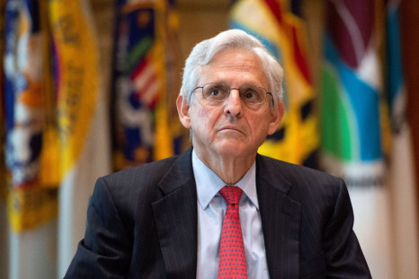 U.S. Attorney General Merrick Garland looks on as he delivers a statement following a briefing from U.S. Marshals Service Director Ronald Davis on a fugitive apprehension initiative aimed at combatting violent crimes in cities with high rates of homicides