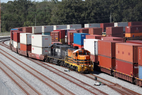 A commercial freight train carries a load of shipping containers at the Port of Savannah, Georgia, U.S. October 17, 2021.  