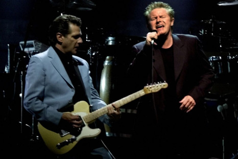Don Henley (R) and Glenn Frey of the legendary rock band The Eagles perform to a sold out crowd at the American Airlines Center in Dallas, July 28, 2001. Reuters/Jeff Mitchell/File Photo