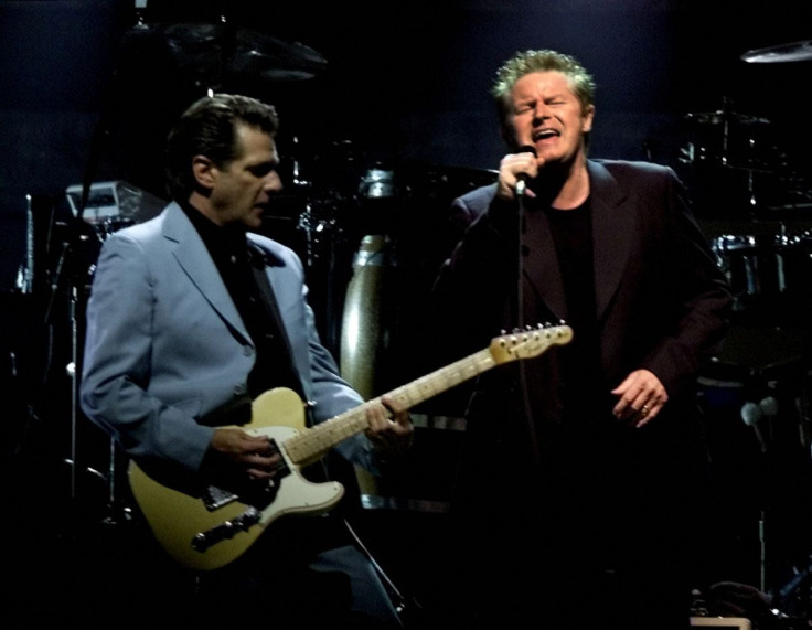 Don Henley (R) and Glenn Frey of the legendary rock band The Eagles perform to a sold out crowd at the American Airlines Center in Dallas, July 28, 2001. Reuters/Jeff Mitchell/File Photo