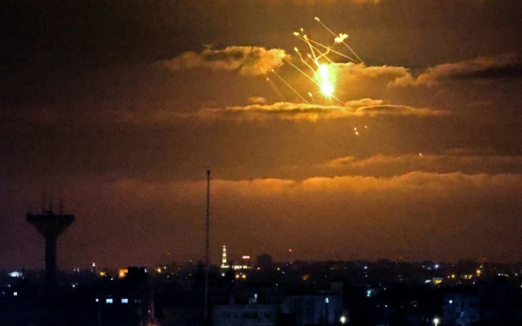 Israel's Iron Dome defence system intercepts incoming missiles fired from the Gaza Strip above the Palestinian enclave, on April 21, 2022. The Iron Dome costs roughly $50,000 per launch