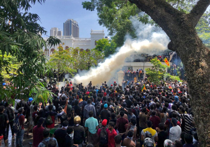 Demonstrators gather outside the office of Sri Lanka's Prime Minister Ranil Wickremesinghe, amid the country's economic crisis, in Colombo, Sri Lanka July 13, 2022. 