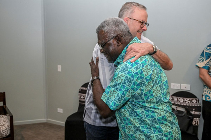 Australia's Prime Minister Anthony Albanese meets with Solomon Islands Prime Minister Manasseh Sogavare on sidelines of the Pacific Islands Forum, in Suva, Fiji July 13, 2022. Joe Armao/Pool via REUTERS