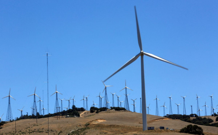 A GE 1.6-100 wind turbine (front R) is pictured at a wind farm in Tehachapi, California June 19, 2013.
