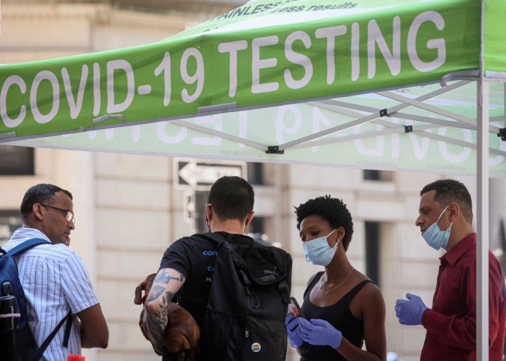 People wait to take coronavirus disease (COVID-19) tests at a pop-up testing site in New York City, U.S., July 11, 2022.  