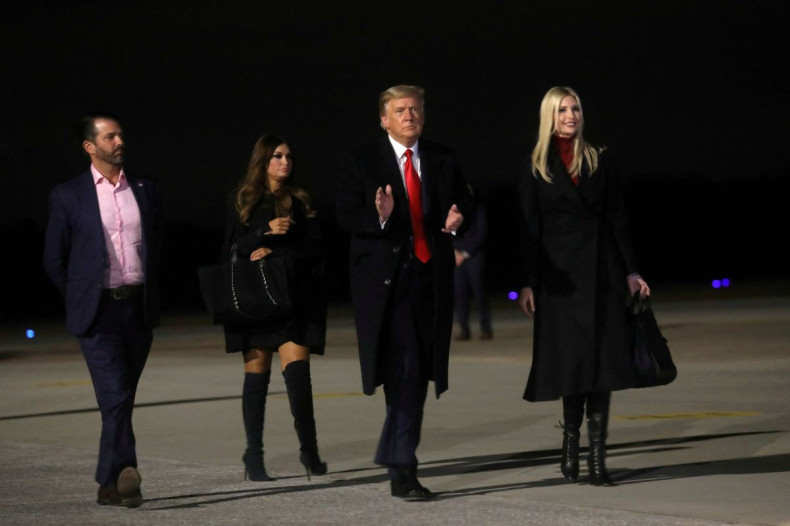 U.S. President Donald Trump, his daughter and White House Senior Advisor Ivanka Trump, his son Donald Trump Jr. and Donald Jr.'s girlfriend Kimberly Guilfoyle, walk to board Air Force One at Dobbins Air Reserve Base, Marietta, Georgia, after a campaign ra