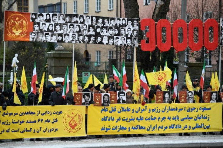 During the trial, protestors demonstrated outside the court over Noury's alleged crimes