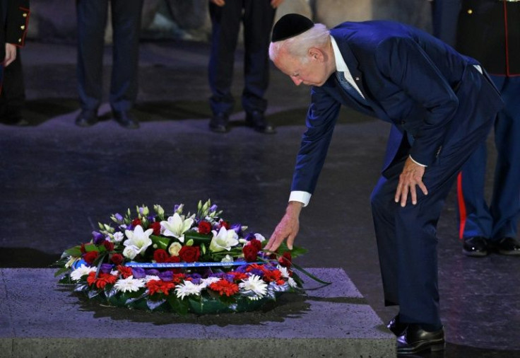 US President Joe Biden lays a wreath during a ceremony at the Hall of Remembrance of the Yad Vashem Holocaust Memorial Centre in Jerusalem
