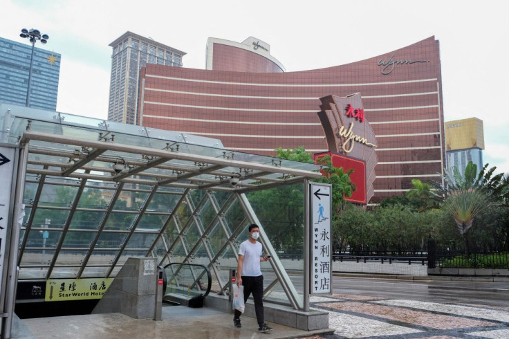 A man walks outside the Wynn Macau casino resort, amid the coronavirus disease (COVID-19) outbreak, in Macau, China July 4, 2022.