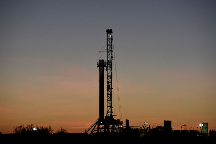 A horizontal drilling rig on a lease owned by Parsley Energy operates at sunrise in the Permian Basin near Midland, Texas U.S. August 24, 2018.