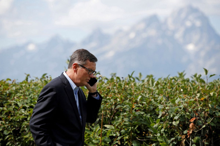 Federal Reserve Vice Chair Richard Clarida talks on the phone during the three-day "Challenges for Monetary Policy" conference in Jackson Hole, Wyoming, U.S., August 23, 2019.