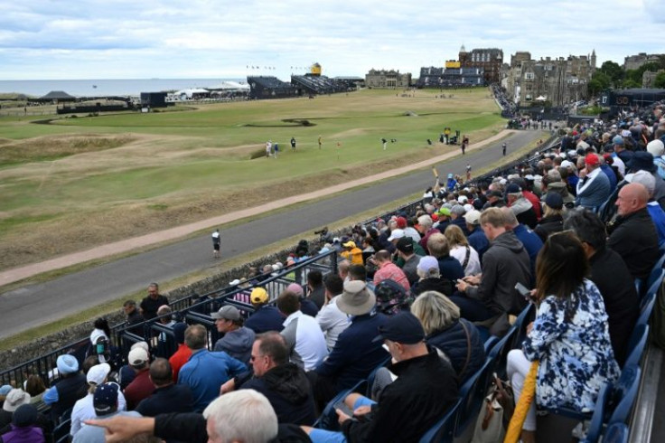 Spectators line the 17th hole at St Andrews on Thursday