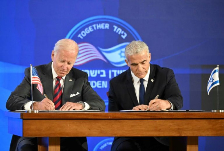 US President Joe Biden and Israel's caretaker Prime Minister Yair Lapid sign a security pledge in Jerusalem on July 14