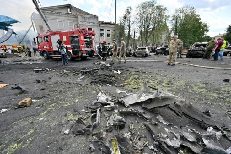 Hundreds of rescue workers were clearing debris from gutted buildings and searching for those still missing after Russian missiles struck Vinnytsia