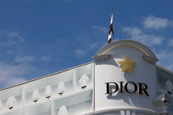 The Dior logo is seen on a building under renovation of luxury brand Dior on the Champs-Elysees avenue in Paris, France, July 13, 2022. 