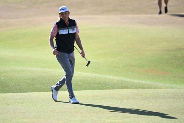 Australia's Cameron Smith shot a superb 64 to take the outright lead in the British Open at the halfway stage