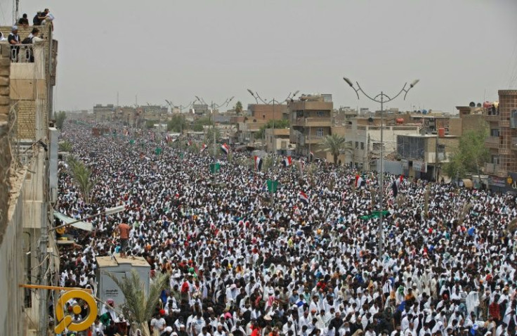 Hundreds of thousands of supporters of Iraqi Shiite cleric Moqtada Sadr rally in Baghdad on Friday