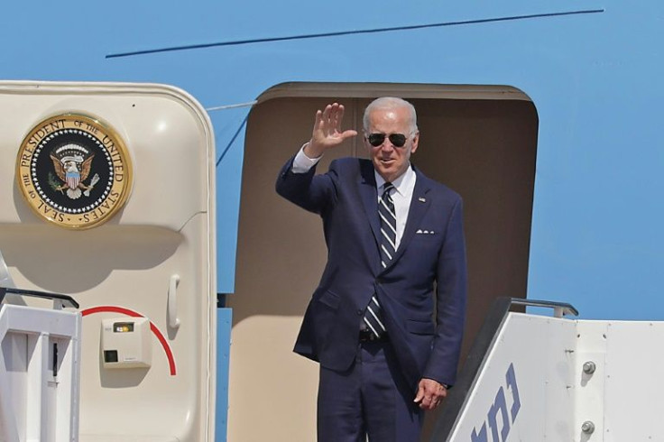Biden waves before boarding Air Force One to depart Israel's Ben Gurion Airport on Friday