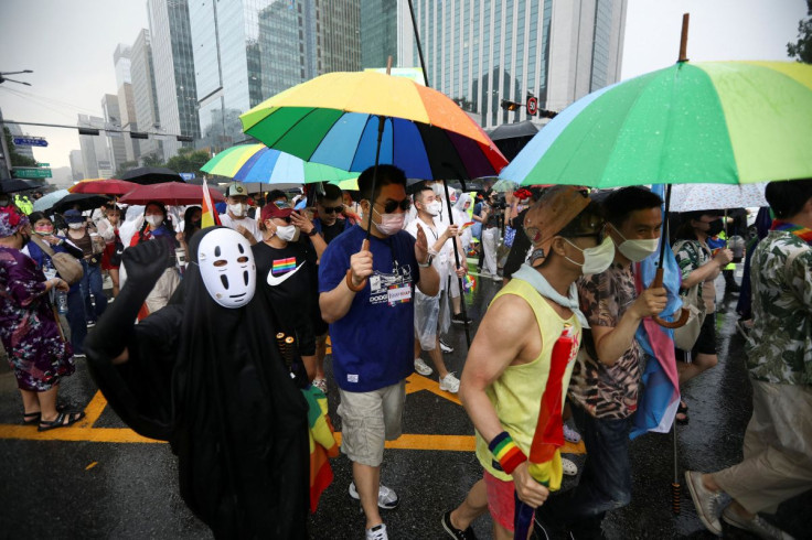 Participants march on the streets during the Korea Queer Culture Festival 2022 in central Seoul, South Korea, July 16, 2022.