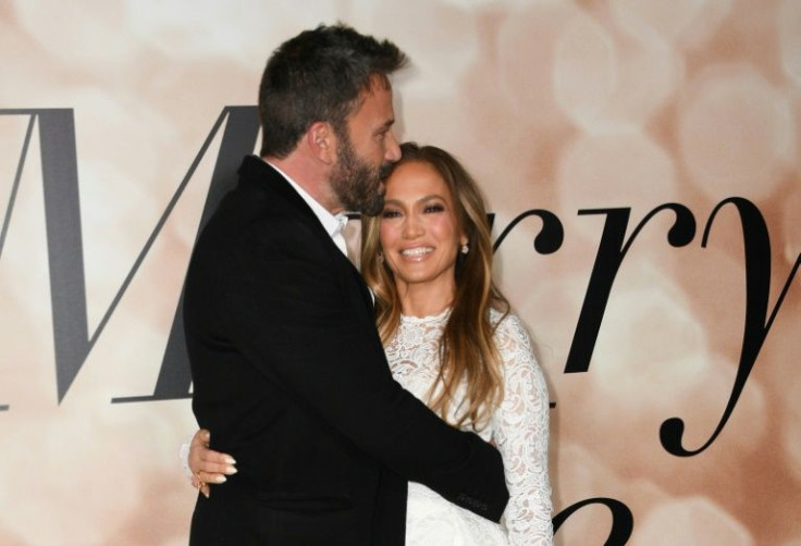 US actress Jennifer Lopez and actor Ben Affleck, seen at a special screening of "Marry Me" at the Directors Guild of America (DGA) in Los Angeles on February 8, 2022, are engaged