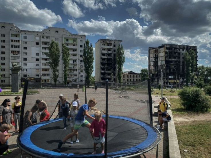 Children play in the war-scarred Ukrainian town of Borodyanka, northwest of Kyiv