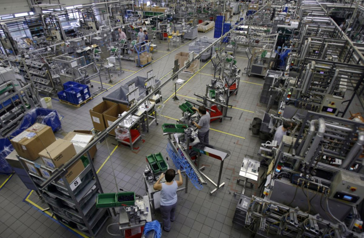 Auto workers assemble fuel lines for exports to Western Europe at Veritas Kft in Dunakiliti, Hungary, November 7, 2008.