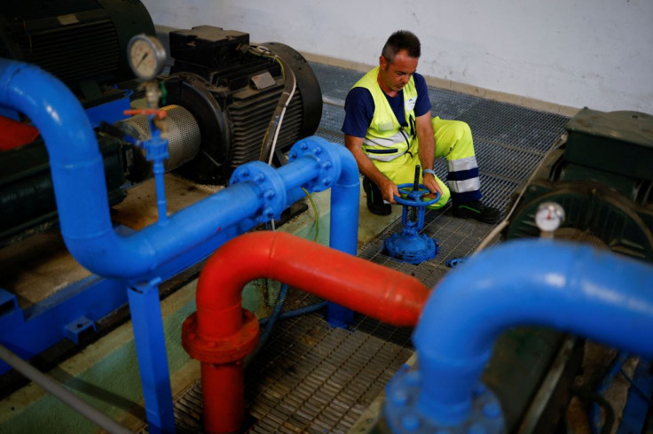 A worker at 'Acqualatina'' closes a valve at a domestic water pumping station as ageing infrastructure and leaky pipes mean a lot of Italyâs precious water is going down the drain before it can even reach the taps, in Cisterna di Latina, Italy, July 13,