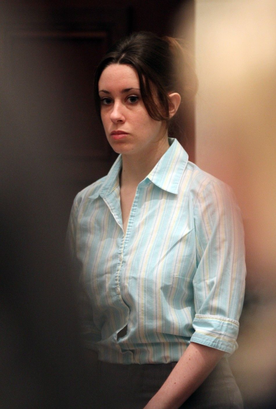 Casey Anthony watches the jury arrive in the courtroom during day 19 of her 1st -degree murder trial at the Orange County Courthouse, in Orlando Florida