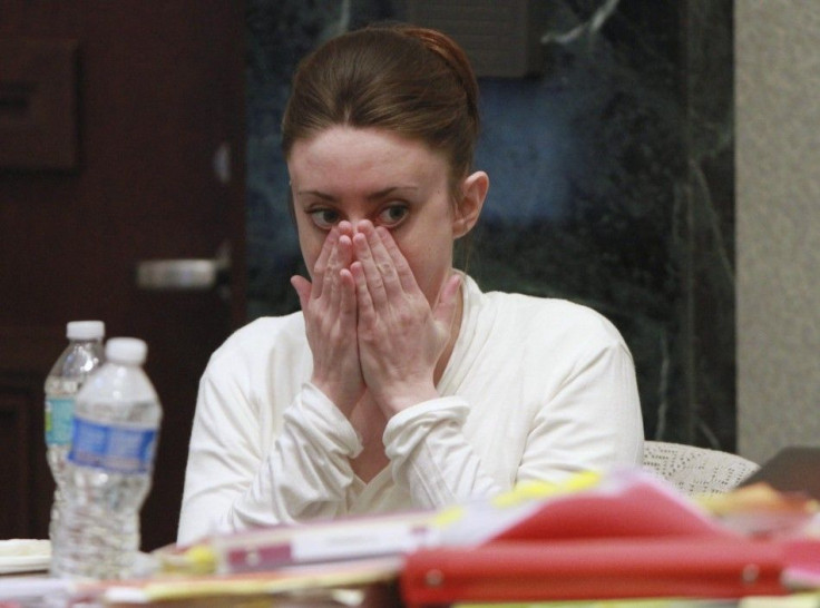Casey Anthony sits during a break during her murder trial at the Orange County Courthouse in Orlando.