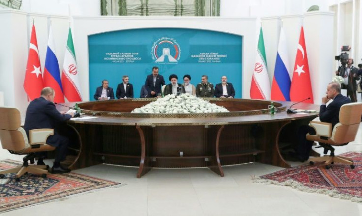 Iran's President Ebrahim Raisi (C), Russian President Vladimir Putin (L), and Turkish President Recep Tayyip Erdogan during their summit in Tehran on Tuesday