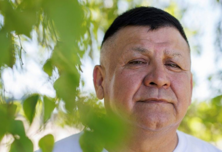 Randy Ermineskin, chief of Ermineskin Cree Nation, poses by a birch tree on June 7 in the Indigenous community of Maskwacis, Alberta. He sat down with AFP to share views and expectations for Pope Francis's end of July visit to Canada in which he is to off