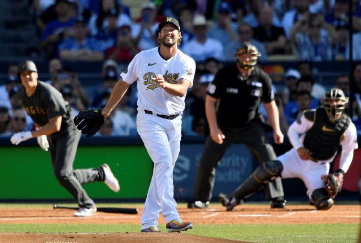 National League starting pitcher Clayton Kershaw reacts after giving up a hit to Shohei Ohtani in the first inning of the 92nd MLB All-Star Game