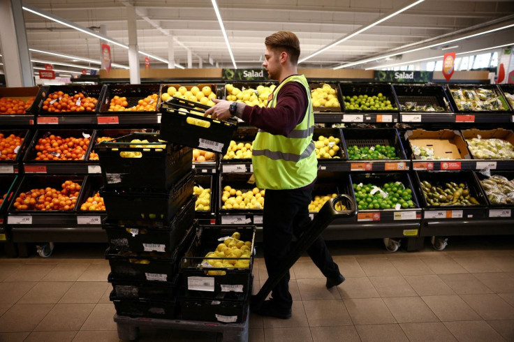 A employee arranges produce inside a Sainsburyâs supermarket in Richmond, west London, Britain, June 27, 2022. Picture taken June 27, 2022. 