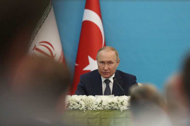 Russian President Vladimir Putin attends a news conference following the Astana Process summit in Tehran, Iran July 19, 2022. Majid Asgaripour/WANA (West Asia News Agency)/Handout via REUTERS    