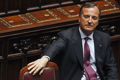 Italian Foreign Minister Franco Frattini looks on during a voting session at the lower chamber of the deputies in Rome