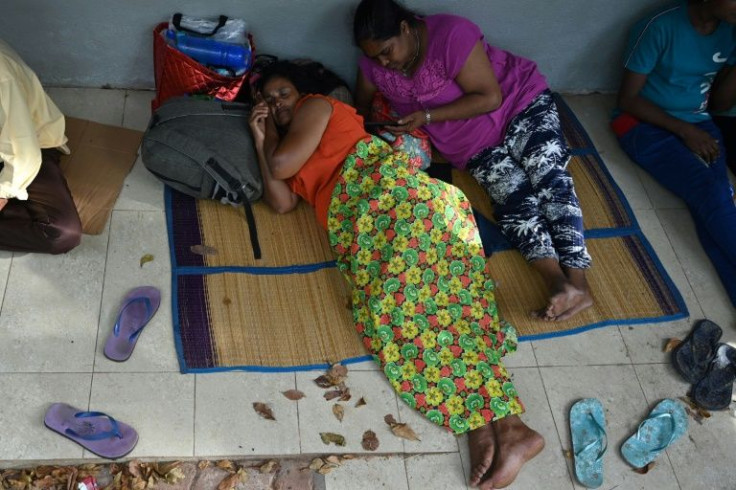 Many passport applicants travel long distances from rural areas and then spend hours without food or water for fear of losing their place in line