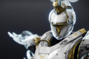 A glowing Titan helmet and gauntlets from the 2022 Solstice event in Destiny 2