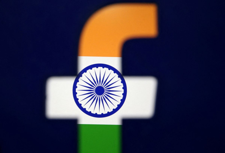 India's flag is seen through a 3D printed Facebook logo in this illustration picture, April 8, 2019.