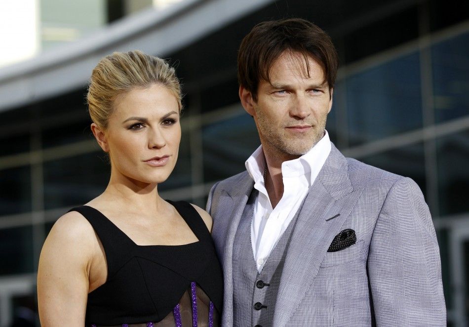 Cast members Anna Paquin and her husband Stephen Moyer pose at the premiere for the fourth season of the HBO television series quotTrue Bloodquot at the Cinerama Dome in Hollywood