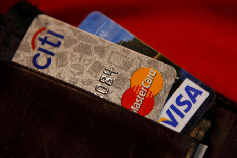 Credit cards are pictured in a wallet in Washington, February 21, 2010. 
