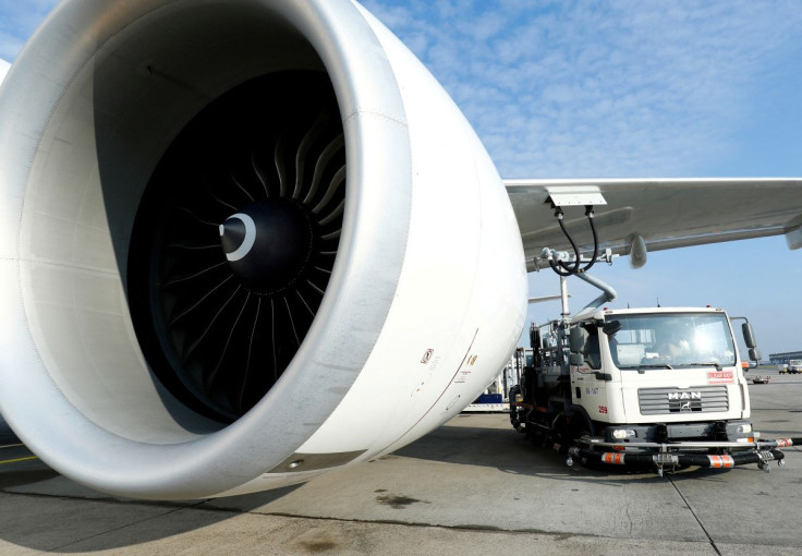 A Lufthansa CO2-neutral Boeing 777 cargo aircraft, operated with sustainable aviation fuel (SAF), is refueled at Frankfurt airport, Germany, November 27, 2020.   