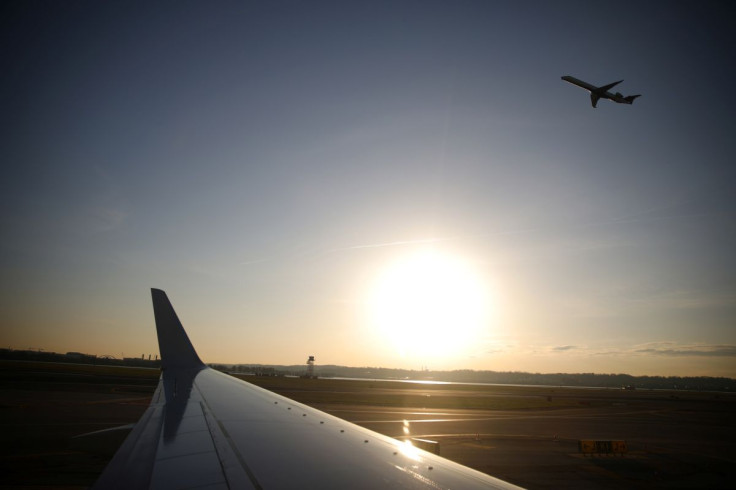  An airplane takes off from the Ronald Reagan National Airport in Washington, U.S., March 18, 2020. 