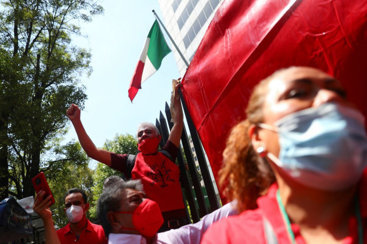 Employees protest outside the headquarters of Telmex after the company's union went on strike after failing to come to an agreement with the company over a new collective labour agreement, in Mexico City, Mexico, July 21, 2022.