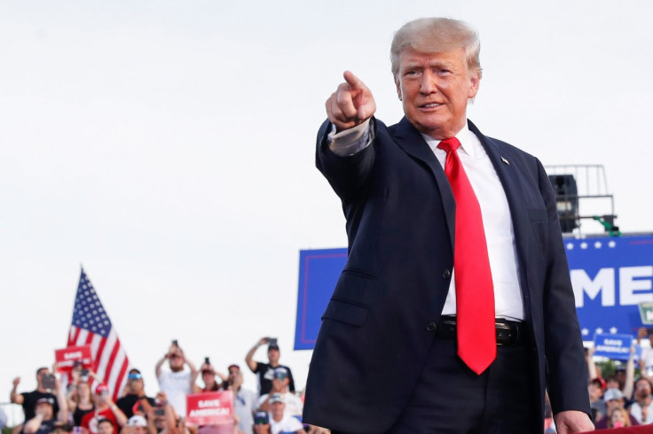 Former U.S. President Donald Trump points during his first post-presidency campaign rally at the Lorain County Fairgrounds in Wellington, Ohio, U.S., June 26, 2021.