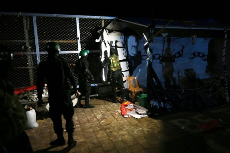 Amnesty International urged Sri Lankan authorities to respect dissent and condemned the use of force against journalists, including a BBC photographer, covering the military action