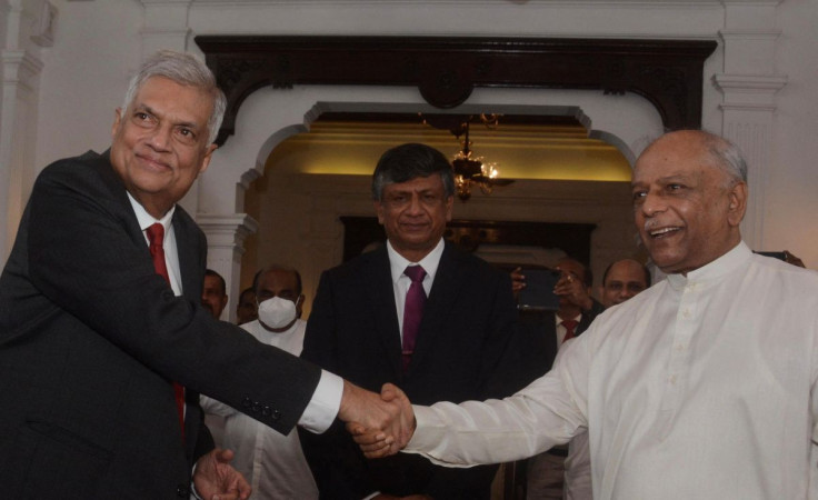 Dinesh Gunawardena is sworn in as the new Prime Minister before President Ranil Wickremesinghe, amid the country's economic crisis, in Colombo, Sri Lanka July 22, 2022.